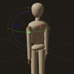 A wooden mannequin in the animation editor with the rotate gizmo on its shoulder.